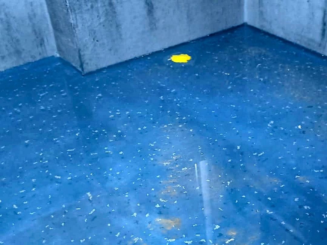 Bathroom walls and floor coated with waterproofing membrane