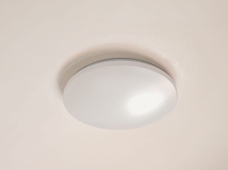 Ceiling light fitting installed in a bedroom