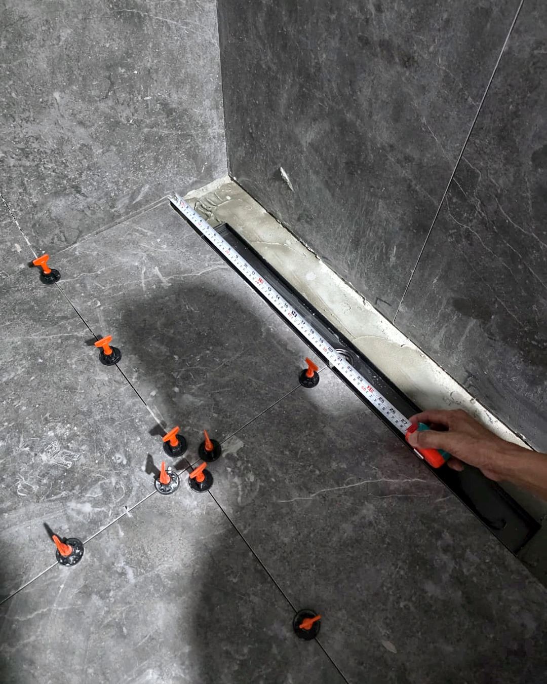 Renovation work – floor tiles linear drain