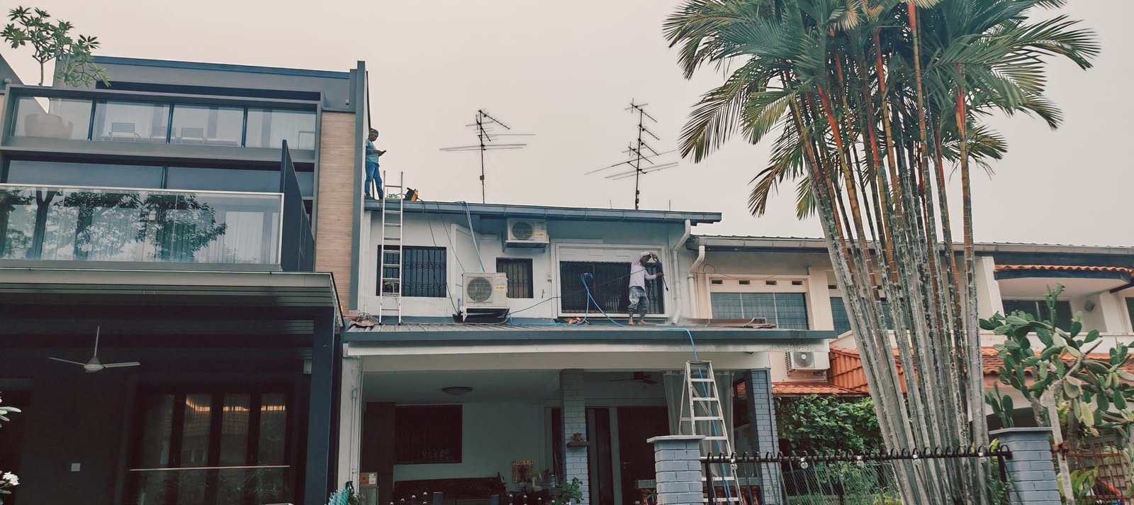Roof pressure washing and ladder access during waterproofing prep