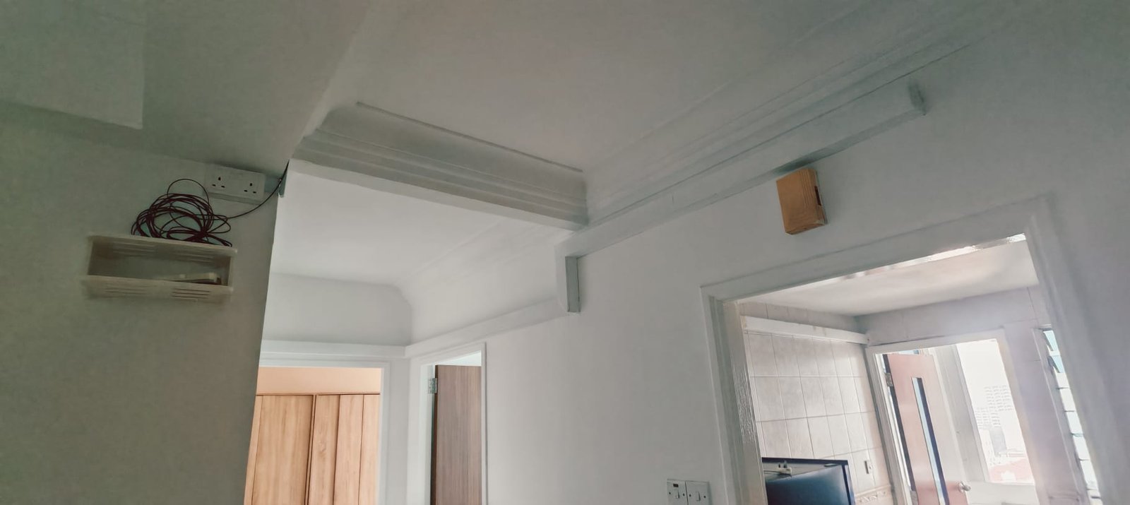 Freshly painted room ceiling beams and walls
