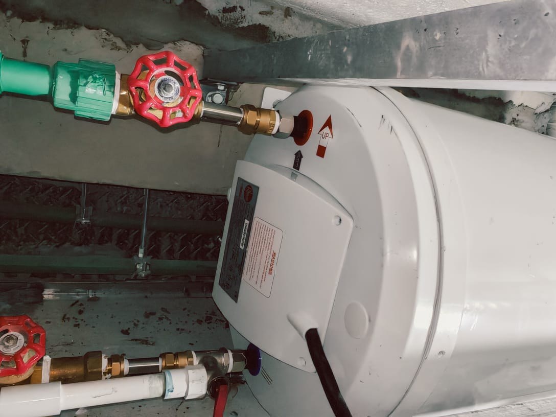 Water heater and piping works with new valves